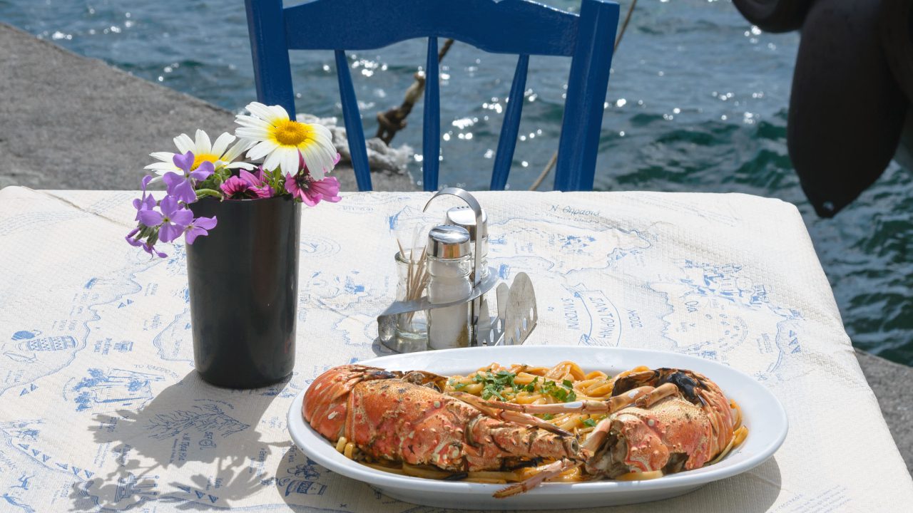 Seafood platter on table by the water.