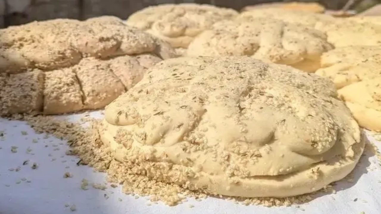 Freshly baked Cypriot bread symbolising authentic Cyprus culinary experiences in Kouklia villages.