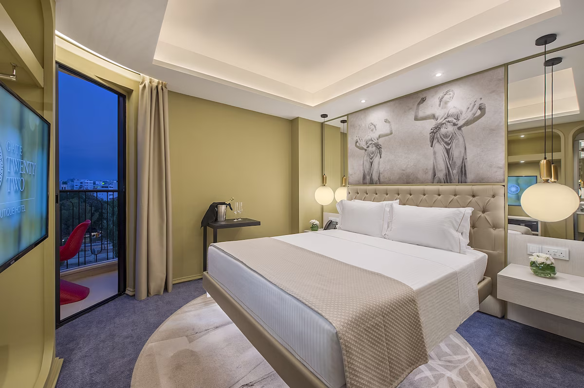Modern hotel room with elegant decor and soft lighting.