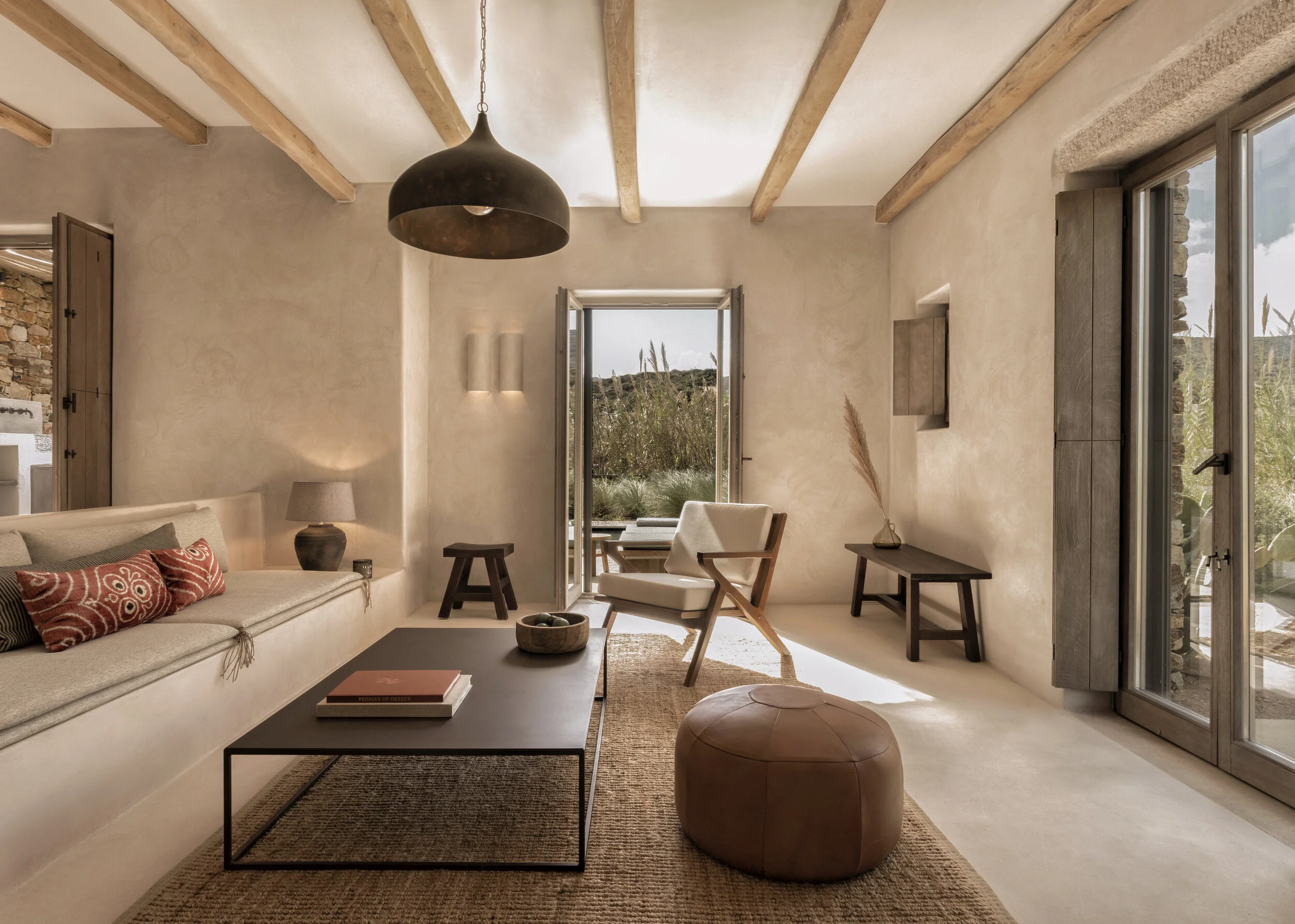 Cozy modern living room with neutral tones and natural light.
