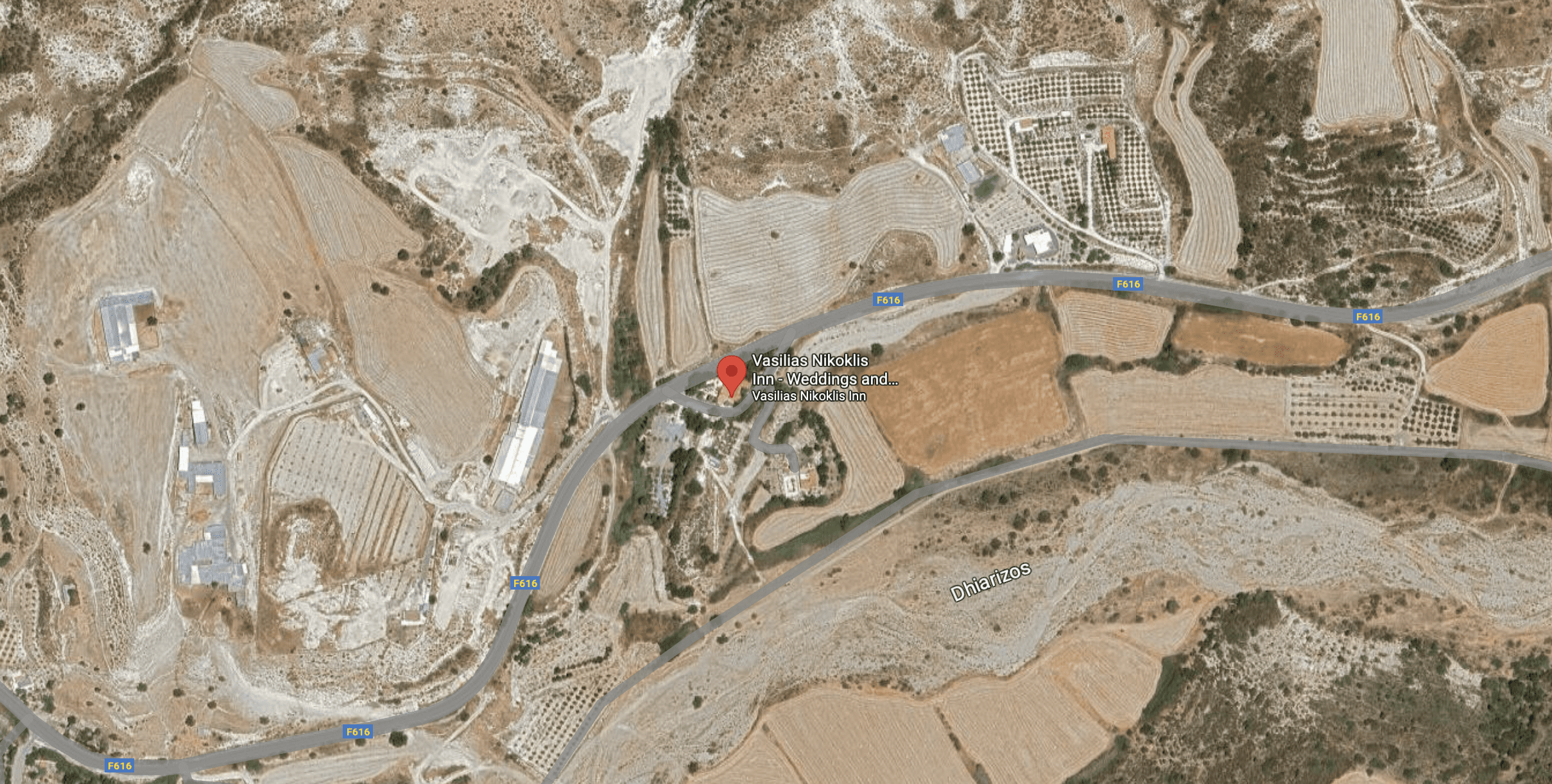 Aerial view of a rural area with roads and fields.