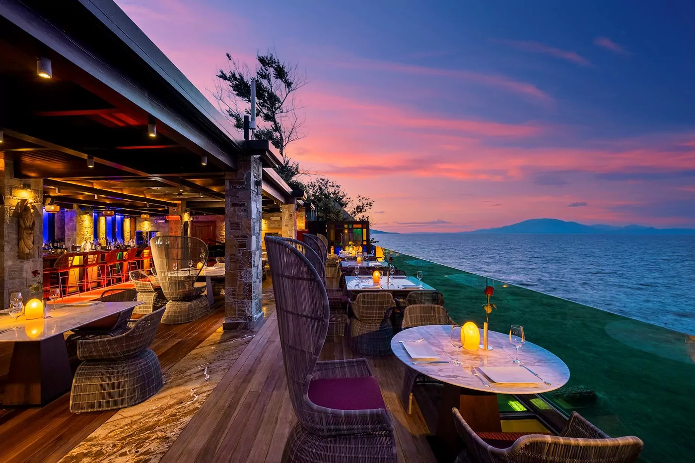 Cozy outdoor dining with sunset mountain views.