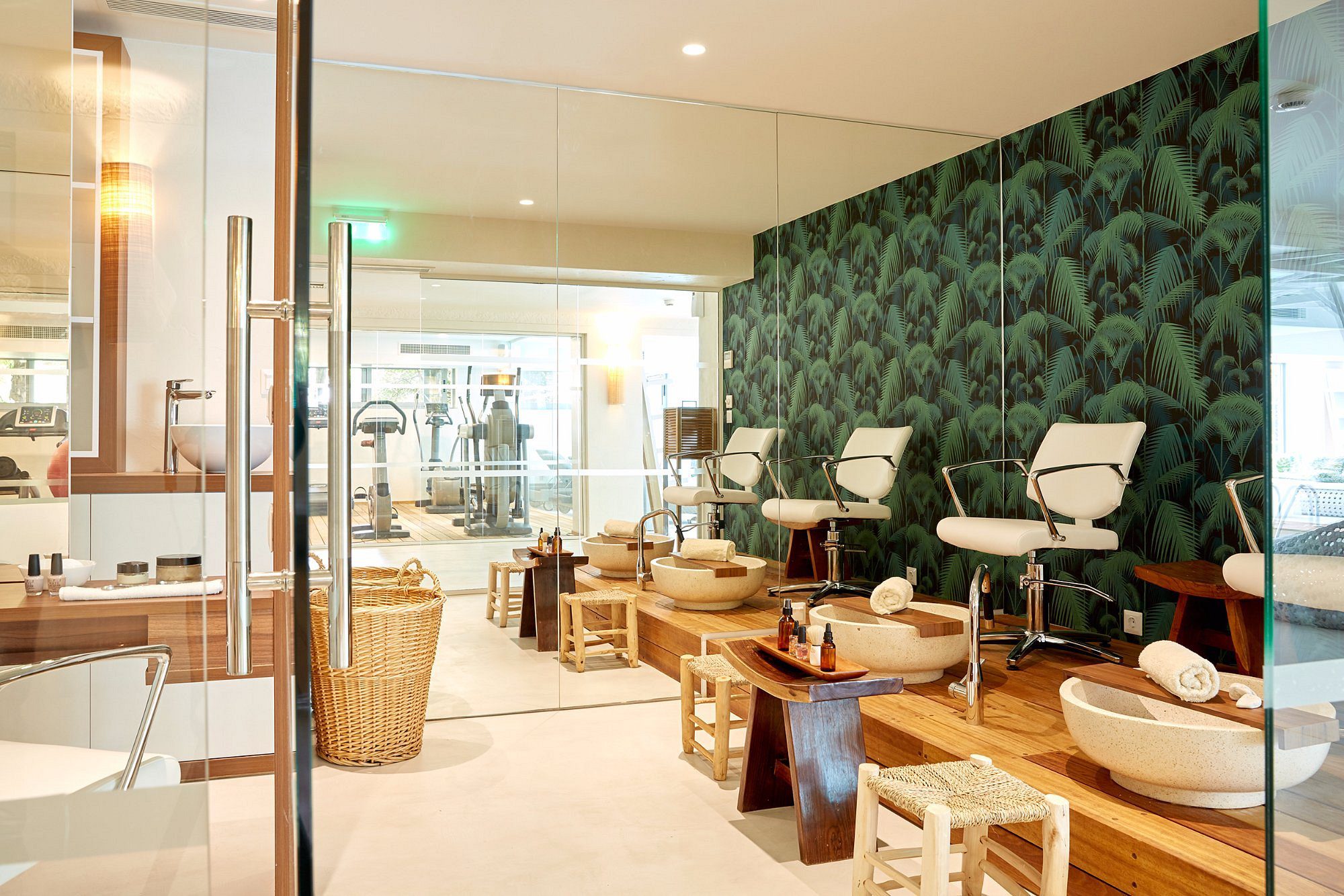 Modern nail salon with stylish decor and comfortable seating.