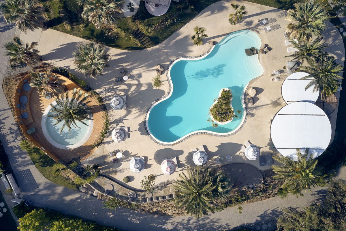 Ekies All Senses Resort in Halkidiki, Greece - eco-luxury beachfront resort surrounded by pine forests, sea views, and minimalist architecture.