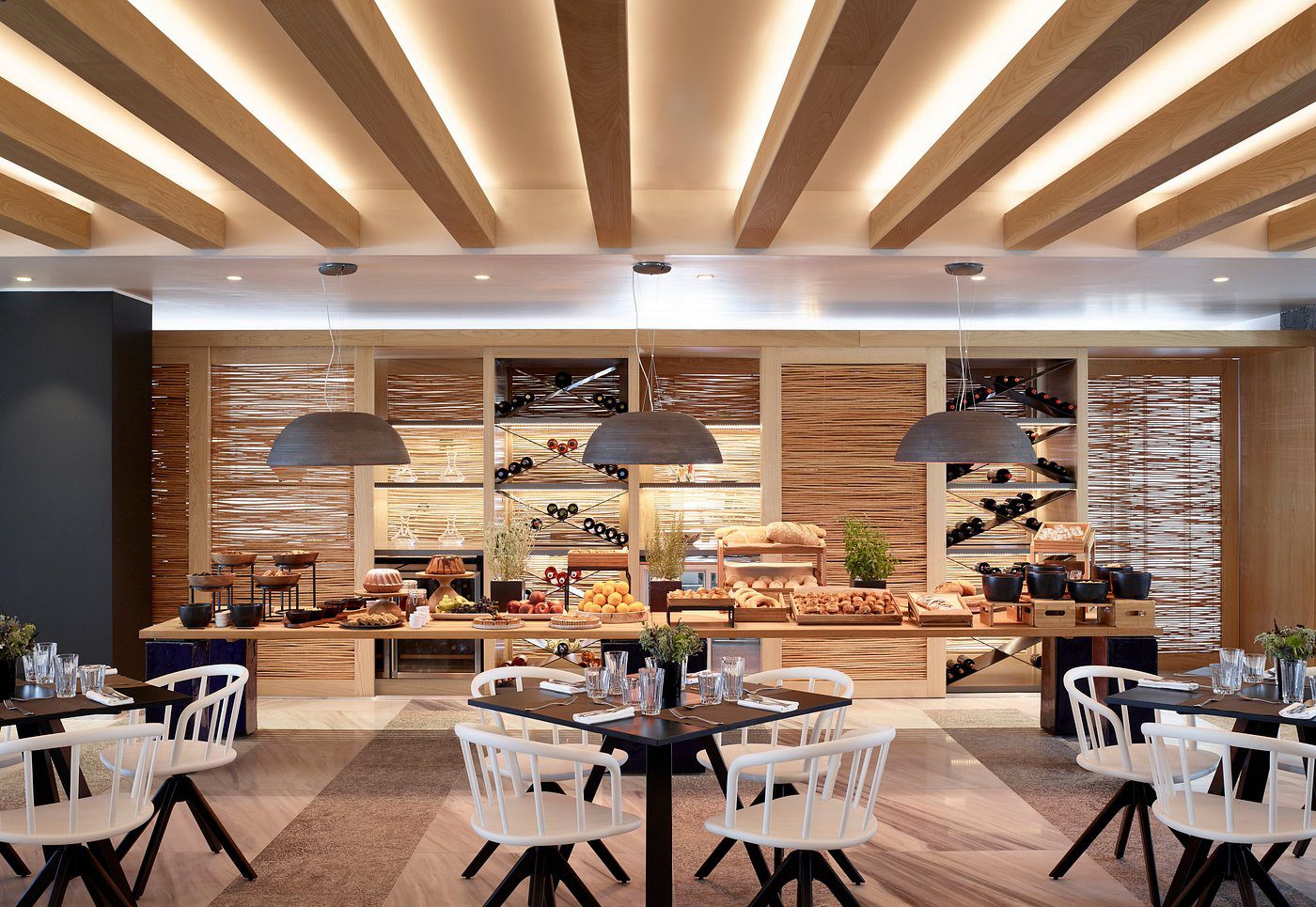 Modern bakery with wooden decor and stylish seating.