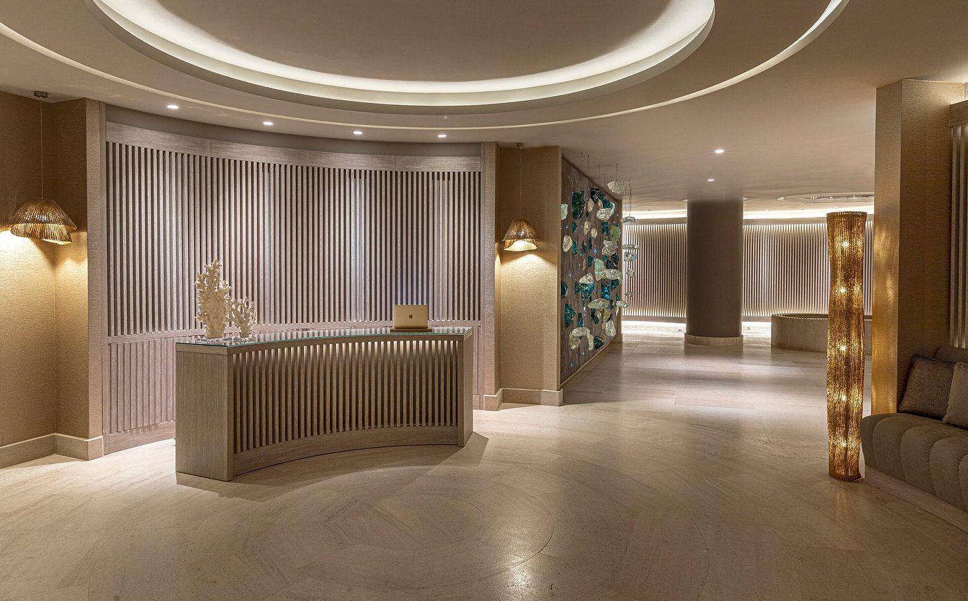 Elegant, modern hotel lobby with soft lighting and stylish decor.