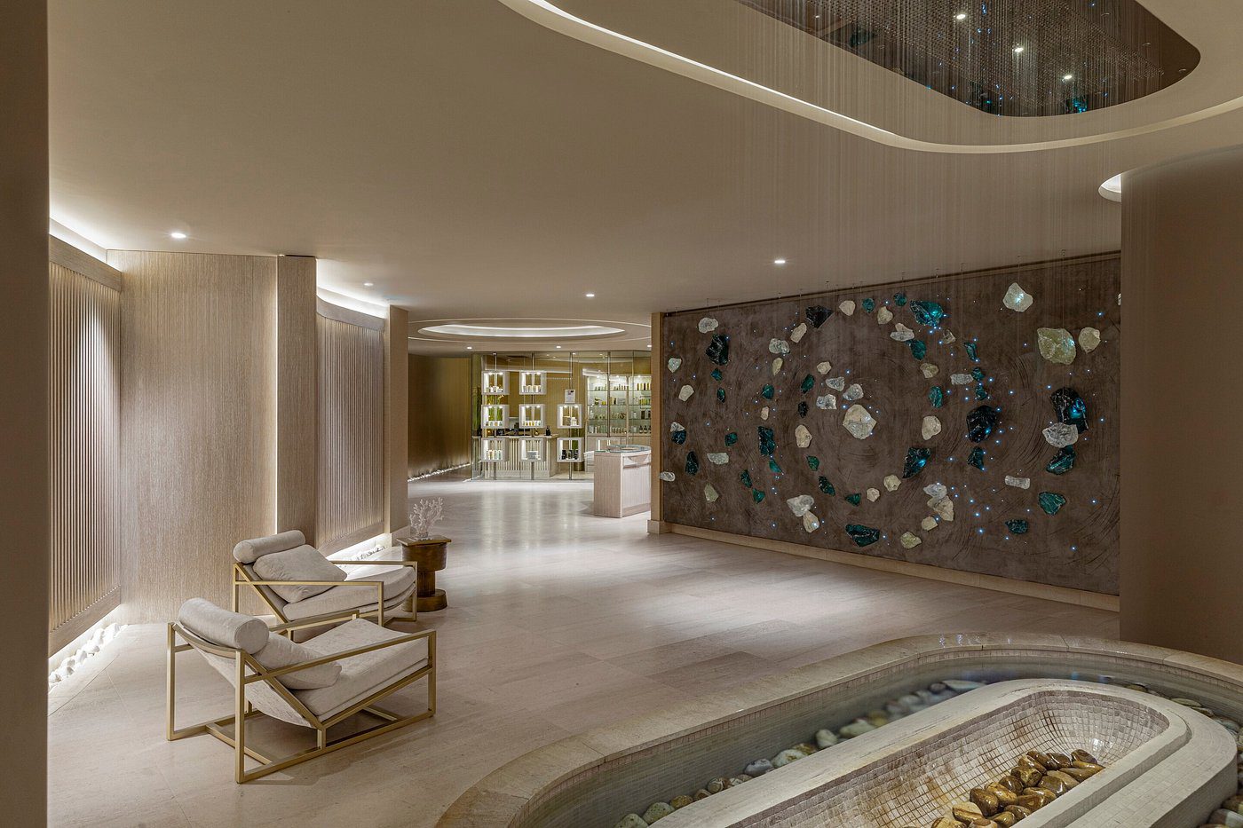 Luxurious living room with modern furniture and artistic wall decor.