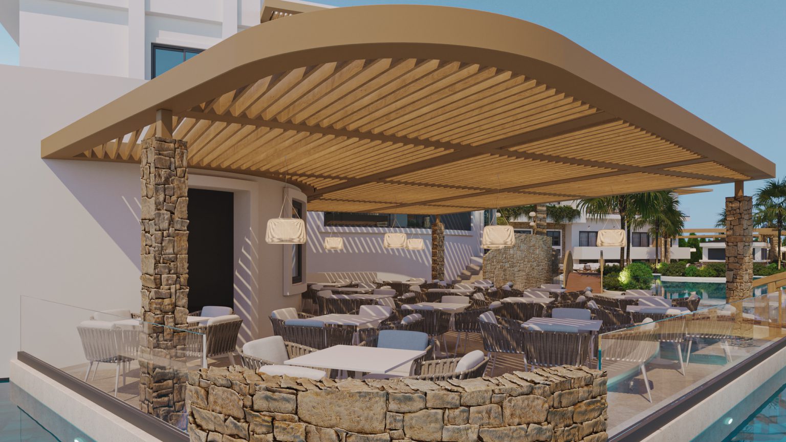 Outdoor dining area with stone walls and shaded pergola seating.