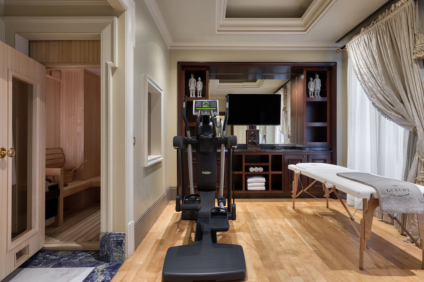 Modern medical examination room with advanced diagnostic equipment.