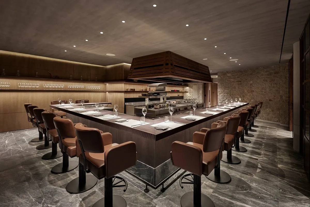 Luxurious restaurant bar with elegant seating and ambient lighting.