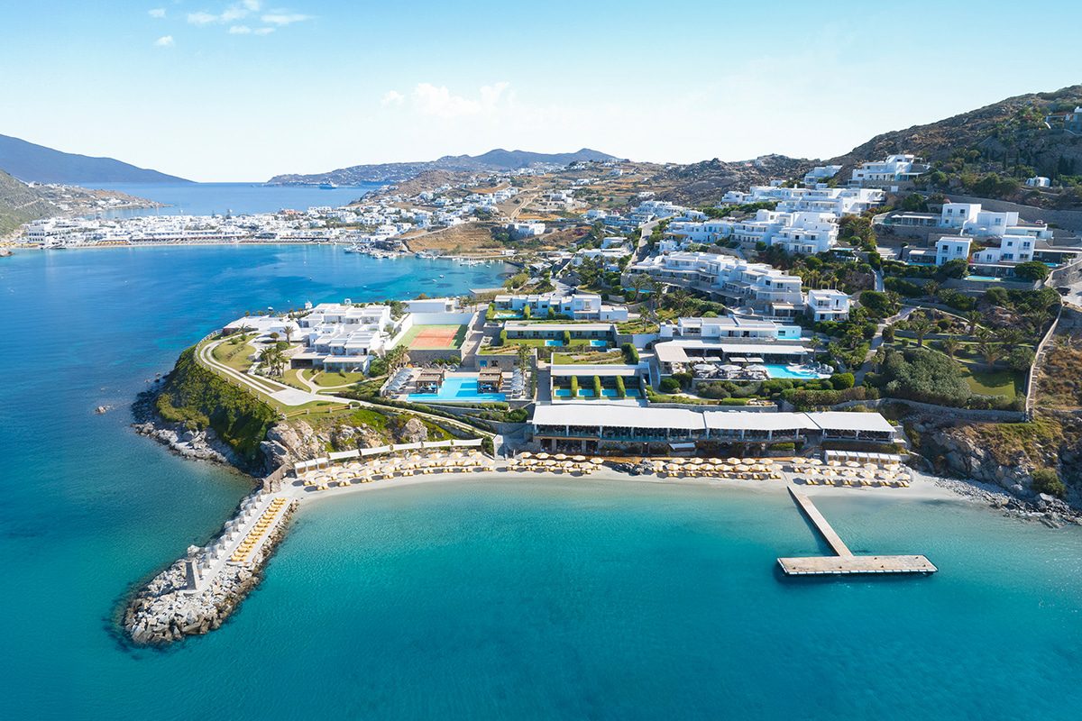 Aerial view of a coastal resort with beaches and buildings.