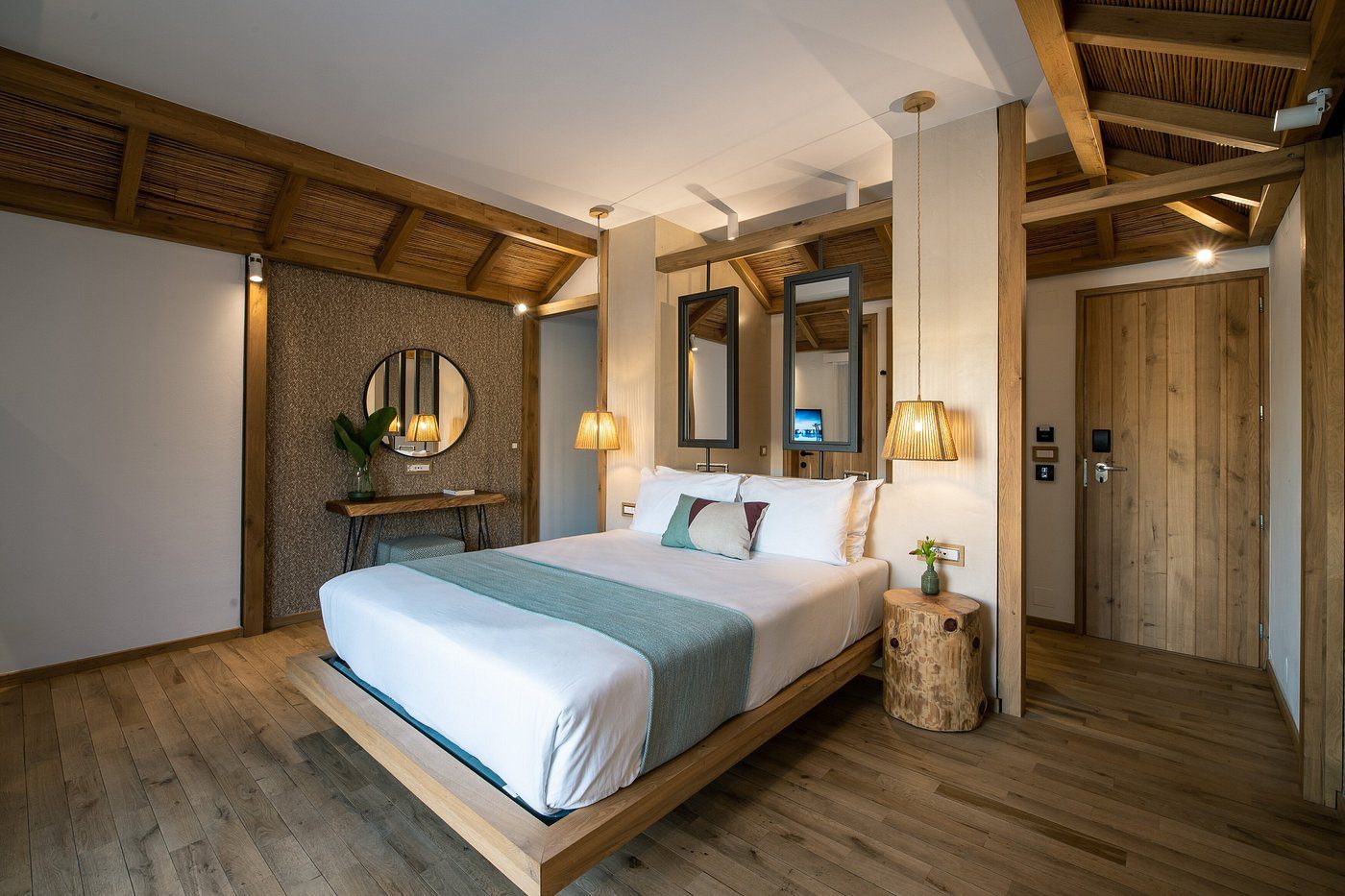 Cozy bedroom with wooden accents and soft lighting.