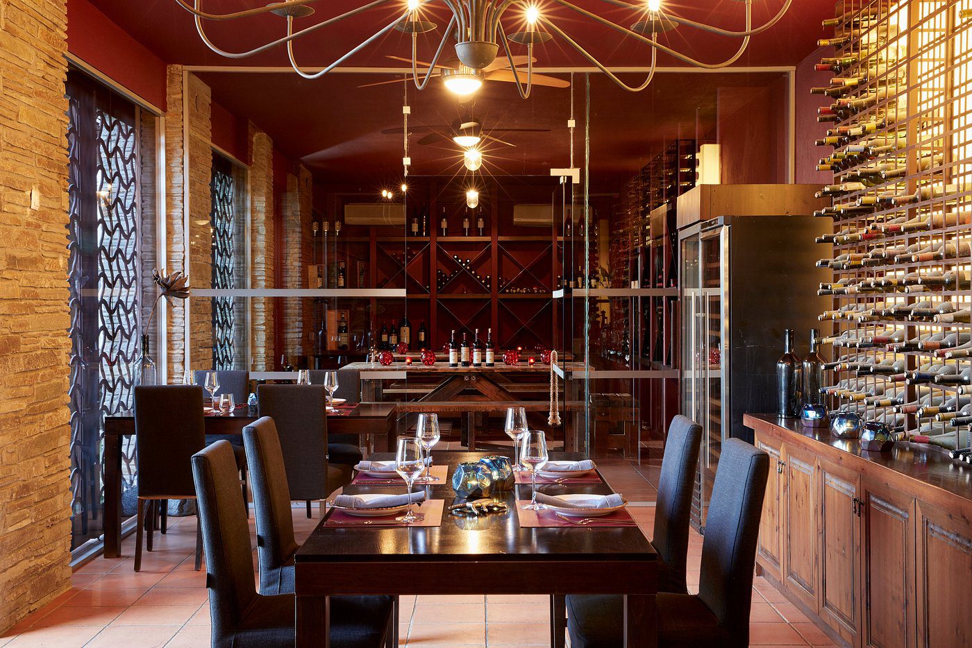 Elegant dining area with warm lighting and modern decor.